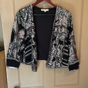 Shimmery vest worn twice